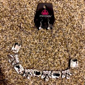 Brand new necklace and earrings by paparazzi.